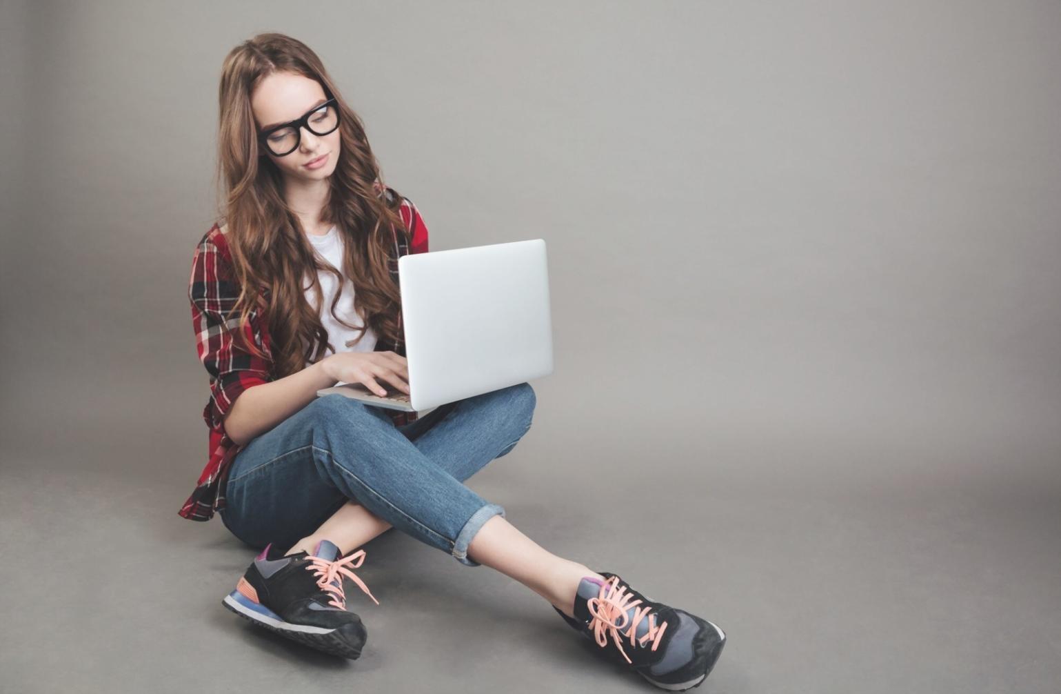 Students working on deep learning projects with neural network visualizations